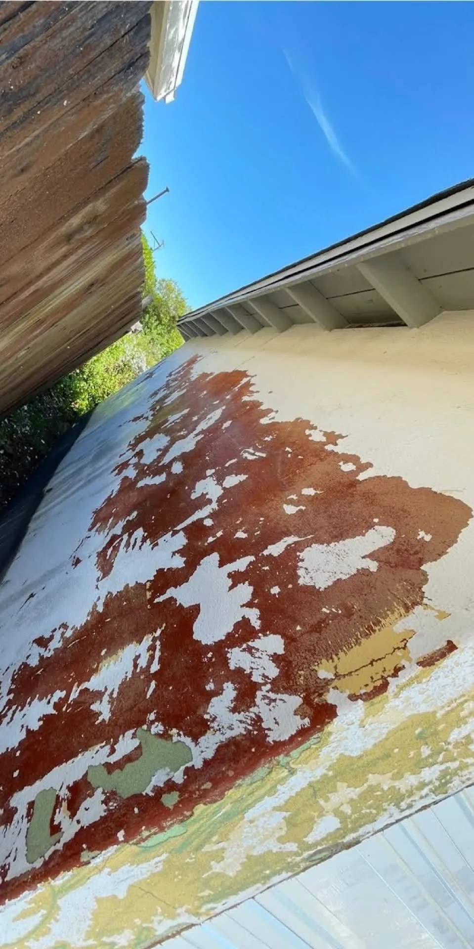 Faded, peeling exterior paint before repainting, San Diego home