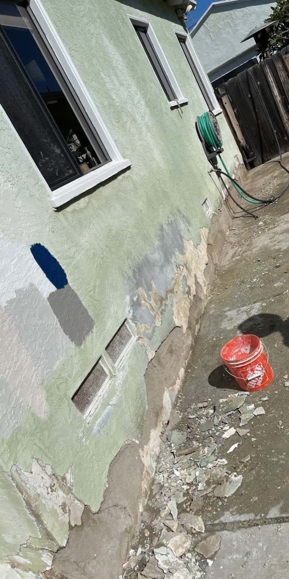 Cracked and damaged stucco before repair, San Diego