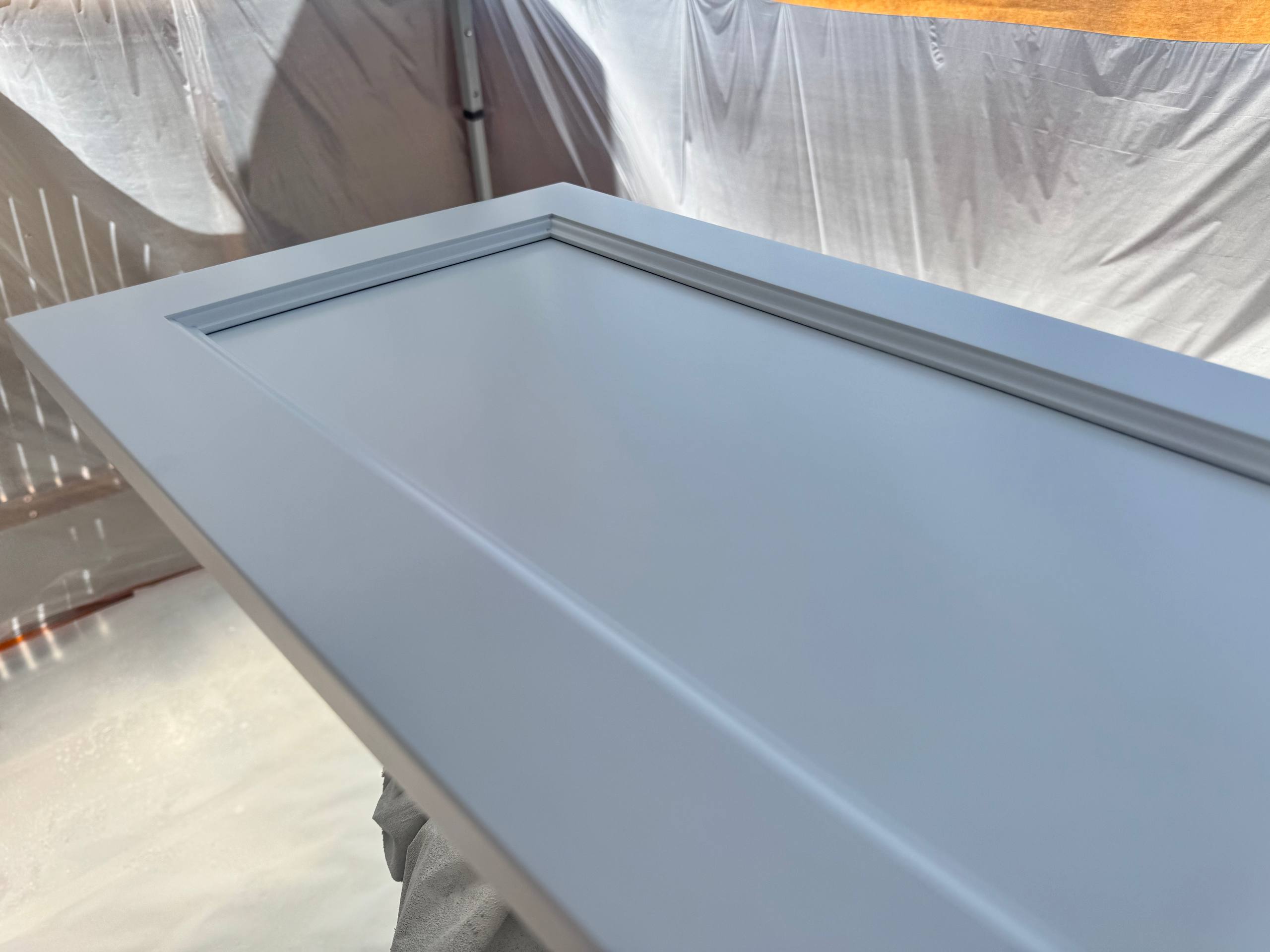 Freshly painted cabinet door close-up, Orange County