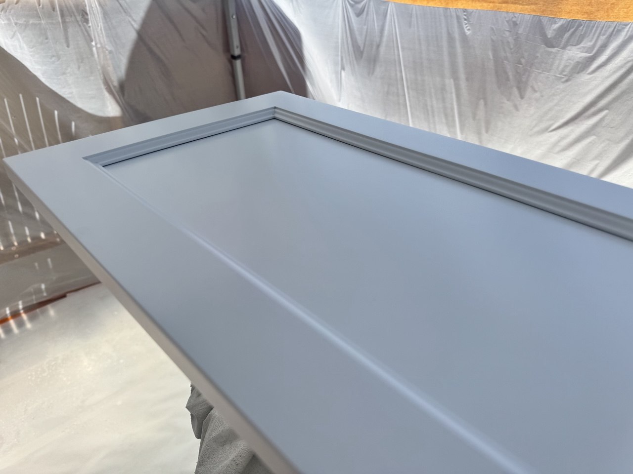 Cabinet door painting in progress, Orange County