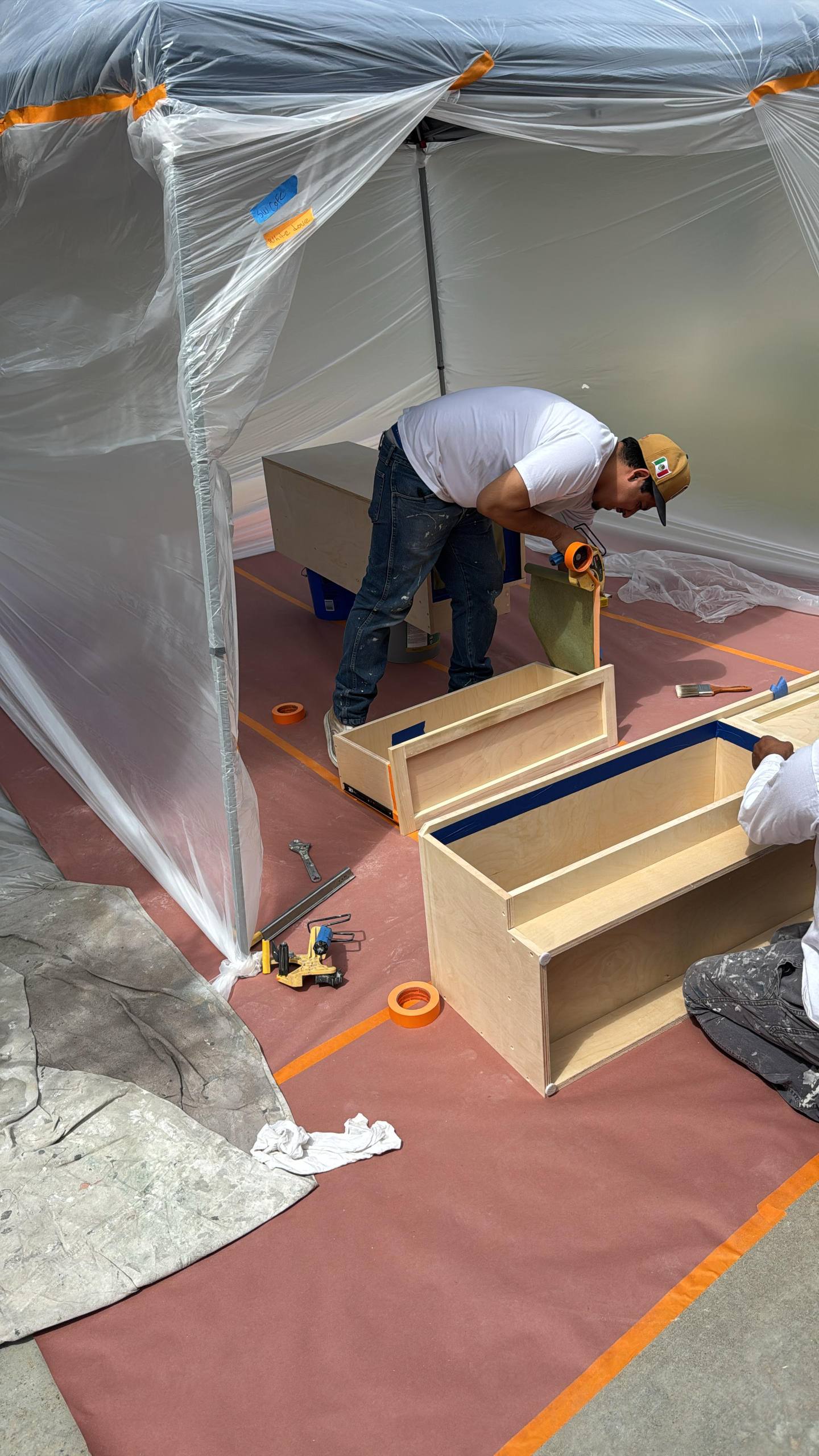 Cabinet spray-painting process, Orange County