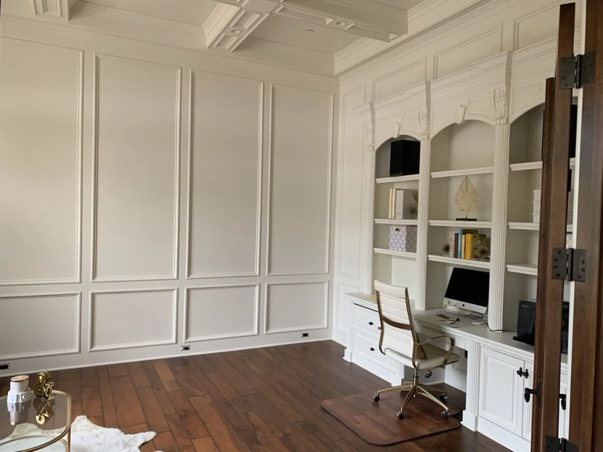 After: cabinet repaint — bright white finish