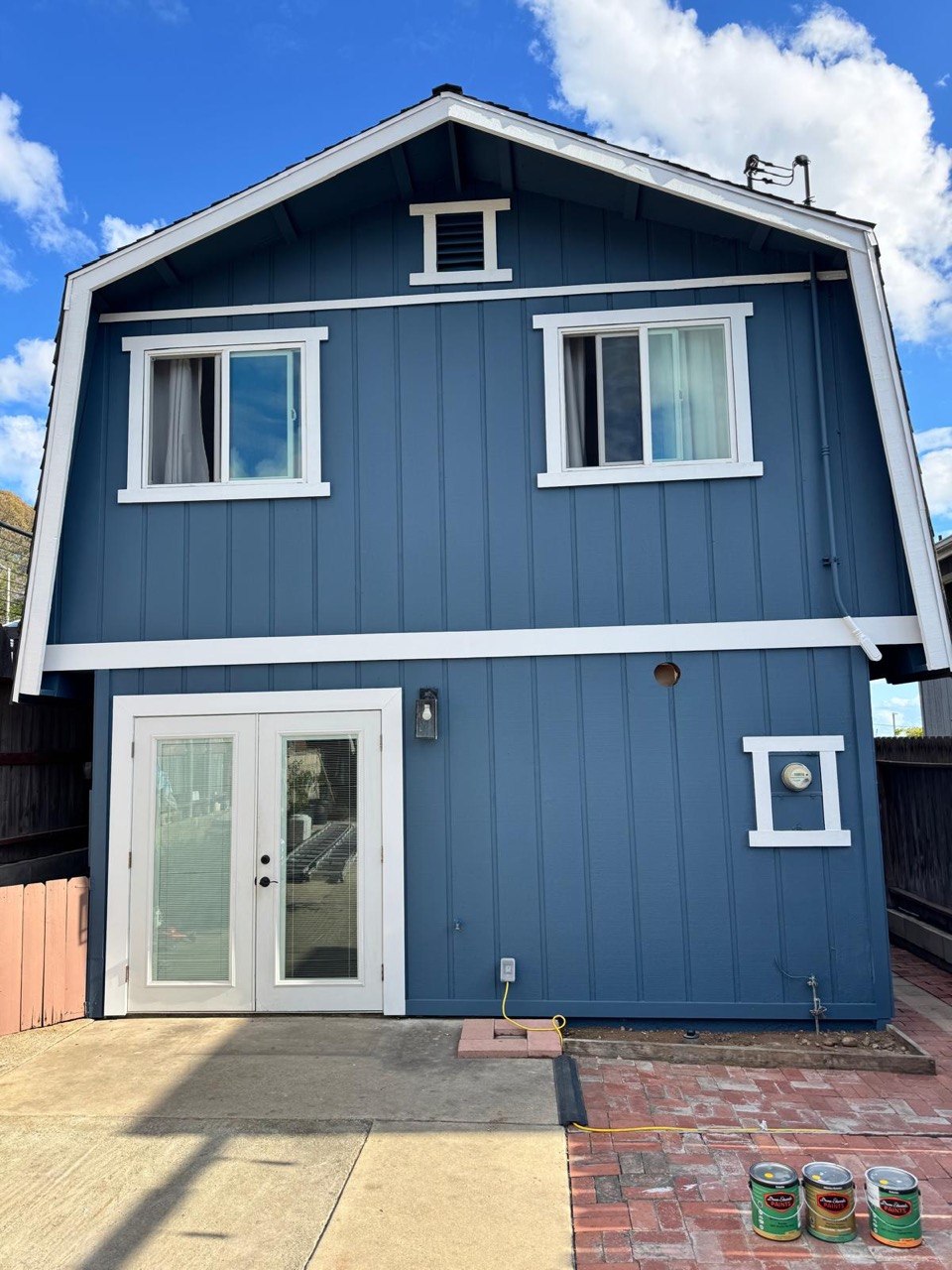 Downtown San Diego home after painting — Outer Space DE5824 with Warm White DEW380 trim by Ross Painting Group